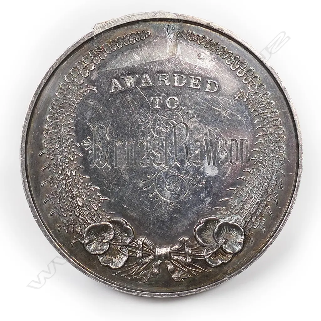 New Zealand Industrial Exhibition of Wellington silver medal awarded to Ernst Rawson in 1885, Image 1++